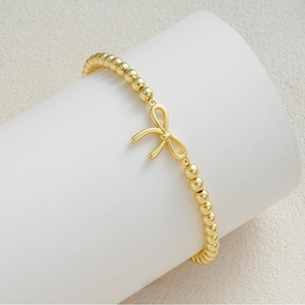 Gold Tone Brass Beaded Bracelet with Bow Accent | Stretch Bracelet